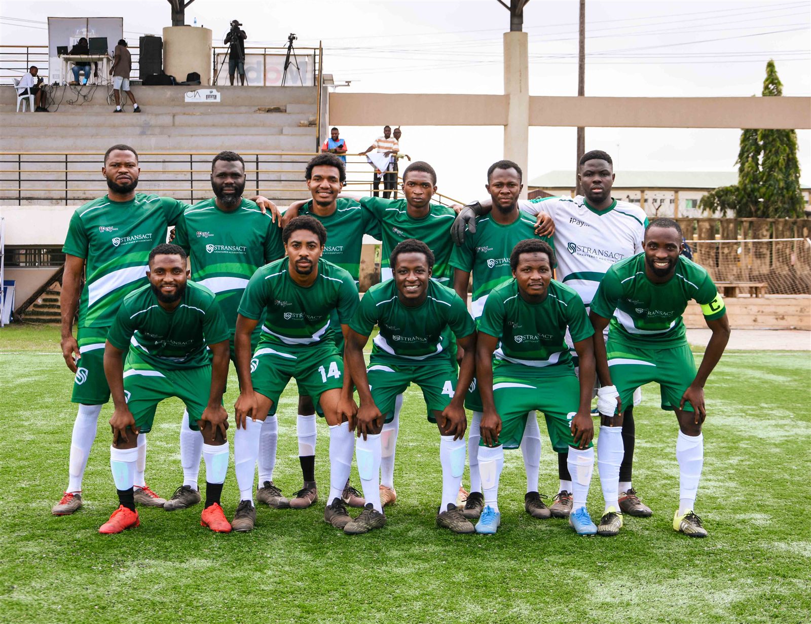 The Stransact and Doftwerks team lined up on the pitch at the Accounting Firms Football Tournament